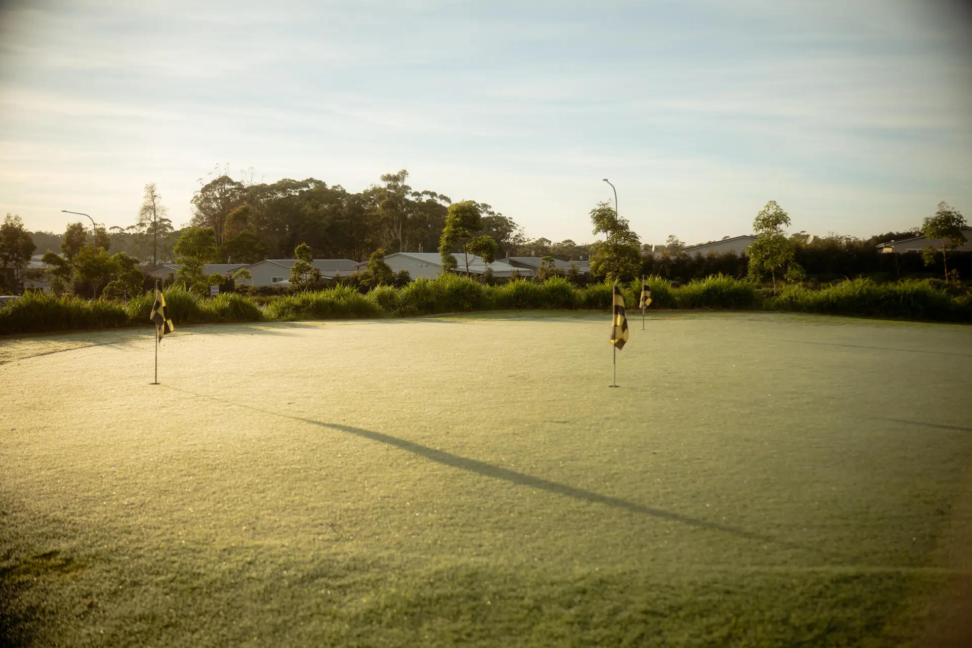 A quiet green at Sussex Inlet Golf Club in early morning light