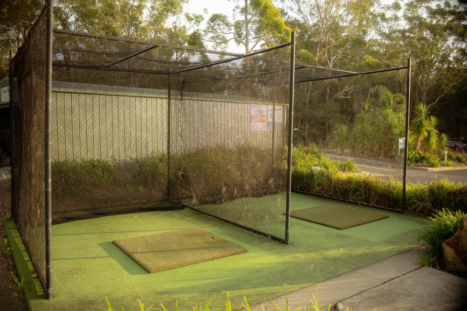 Practice nets beside the course